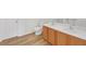 Bathroom featuring double sink vanity, wood floors, and bright lighting at 7459 Old Chapel, South Fulton, GA 30349
