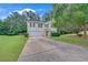 Charming two-story home with a well-maintained front yard and a classic suburban feel at 7459 Old Chapel, South Fulton, GA 30349
