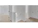 Hallway with white walls, carpeted floors and white trim at 7459 Old Chapel, South Fulton, GA 30349
