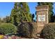 Community entrance sign for Overton Place surrounded by mature trees and landscaping at 813 Whittington Parkway Sw, Marietta, GA 30060