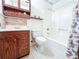Bathroom with a vanity, toilet, and tub/shower combo at 1183 Iron Gate Blvd, Jonesboro, GA 30238