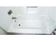 A clean bathtub featuring a shower head at 1183 Iron Gate Blvd, Jonesboro, GA 30238
