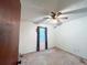 Neutral bedroom with carpet, a window, and ceiling fan at 1183 Iron Gate Blvd, Jonesboro, GA 30238