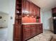 Kitchen built-ins with beadboard backing, lighting, and lots of storage at 1183 Iron Gate Blvd, Jonesboro, GA 30238