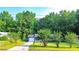 Well-manicured front lawn and landscaping leading up to this cozy, single-story home with attached garage at 1183 Iron Gate Blvd, Jonesboro, GA 30238