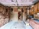 The garage has storage cabinets and a work area with an open doorway leading to another area at 1183 Iron Gate Blvd, Jonesboro, GA 30238