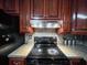 The kitchen features modern appliances, tile floors, and lots of cabinet space at 1183 Iron Gate Blvd, Jonesboro, GA 30238