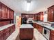 An updated kitchen with an island and plenty of cabinet space at 1183 Iron Gate Blvd, Jonesboro, GA 30238