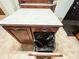 Kitchen island with storage and a pull-out trash bin at 1183 Iron Gate Blvd, Jonesboro, GA 30238