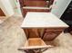 Kitchen island with light countertops and an open storage drawer at 1183 Iron Gate Blvd, Jonesboro, GA 30238