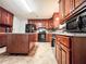 This kitchen features an island, stainless steel appliances, and plenty of cabinet space at 1183 Iron Gate Blvd, Jonesboro, GA 30238