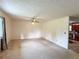Bright living room with view into the kitchen and dark trim at 1183 Iron Gate Blvd, Jonesboro, GA 30238