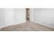 Bedroom with neutral-colored walls and plush carpet at 12225 Anchor Way, Hampton, GA 30228