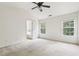 Spacious bedroom with neutral carpet, vaulted ceilings, and a ceiling fan at 626 Pecan Knoll Dr # 13, Marietta, GA 30008