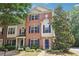 Attractive brick townhome with a well-maintained lawn, beautiful landscaping, and a charming entryway at 626 Pecan Knoll Dr # 13, Marietta, GA 30008