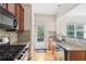 Well-appointed kitchen with stainless steel appliances, granite countertops, and ample storage space at 626 Pecan Knoll Dr # 13, Marietta, GA 30008