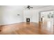 Expansive living room showcases hardwood flooring, a fireplace, and seamless transition to dining area at 626 Pecan Knoll Dr # 13, Marietta, GA 30008