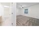Bedroom view of bath and closet featuring carpet, ceiling fan and natural light at 838 Lake Hollow Sw Blvd, Marietta, GA 30064