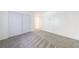Neutral carpeted bedroom with closet and entry to a bathroom at 838 Lake Hollow Sw Blvd, Marietta, GA 30064