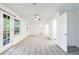 Bright primary bedroom boasts new carpet, ceiling fan, and exterior access at 838 Lake Hollow Sw Blvd, Marietta, GA 30064