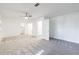 Spacious primary bedroom featuring soft carpet, a ceiling fan, and neutral paint at 838 Lake Hollow Sw Blvd, Marietta, GA 30064