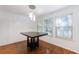 Dining room features stylish light fixture and natural light from three windows at 838 Lake Hollow Sw Blvd, Marietta, GA 30064