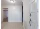 Bright foyer with tiled floors and an open doorway leading to other rooms at 838 Lake Hollow Sw Blvd, Marietta, GA 30064