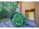 Inviting front entrance with well-maintained landscaping and a modern front door at 838 Lake Hollow Sw Blvd, Marietta, GA 30064