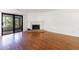 Spacious living room boasting a fireplace and sliding glass doors to a patio at 838 Lake Hollow Sw Blvd, Marietta, GA 30064