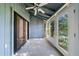 Enclosed sunroom offers a cozy space with screened windows to enjoy natural light and outdoor views at 838 Lake Hollow Sw Blvd, Marietta, GA 30064