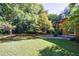 Spacious green yard and landscaped area at 838 Lake Hollow Sw Blvd, Marietta, GA 30064