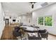 Finished basement with recessed lights, hardwood floors, and staged poker room at 9310 Chapelwood Dr, Johns Creek, GA 30022