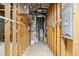 Utility area in basement with water heater, HVAC, and electrical panel in unfinished space at 9310 Chapelwood Dr, Johns Creek, GA 30022