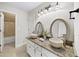 Elegant bathroom with granite countertops, vessel sinks, and designer fixtures at 9310 Chapelwood Dr, Johns Creek, GA 30022