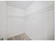 Walk-in closet with storage shelving at 9310 Chapelwood Dr, Johns Creek, GA 30022
