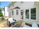 Cozy deck with outdoor furniture, ideal for entertaining or relaxing outdoors at 9310 Chapelwood Dr, Johns Creek, GA 30022