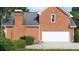 Brick home with an attached garage and well-maintained landscaping at 9310 Chapelwood Dr, Johns Creek, GA 30022
