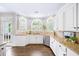 Beautiful kitchen with granite countertops, stainless steel appliances and modern cabinetry at 9310 Chapelwood Dr, Johns Creek, GA 30022