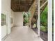 Back patio leading to yard with stairway to deck, accessible outdoor living space at 9310 Chapelwood Dr, Johns Creek, GA 30022