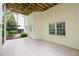 Covered patio with ceiling, offering shade and outdoor space for activities at 9310 Chapelwood Dr, Johns Creek, GA 30022