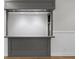 Close up of basement wet bar with shelving, counterspace and recessed lights at 9310 Chapelwood Dr, Johns Creek, GA 30022