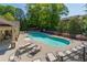 Community pool with sun loungers and lush landscaping at 1382 Doublegate Ne Dr, Atlanta, GA 30319
