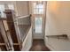 Interior view of the entryway with dark wood floors, staircase and a clear view to the outside at 1382 Doublegate Ne Dr, Atlanta, GA 30319