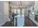 Bright kitchen features white cabinets, an island with a marble countertop, and stainless steel appliances at 1382 Doublegate Ne Dr, Atlanta, GA 30319