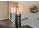 Interior view of staircase with dark wood floors and wrought iron railing, leading to other floors at 1382 Doublegate Ne Dr, Atlanta, GA 30319
