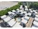 Overhead view of townhome community featuring a refreshing pool, lush landscaping, and modern architectural design at 19 Moda Ln, Atlanta, GA 30316