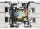 Drone's-eye view of a townhome community featuring a pool in a courtyard setting at 19 Moda Ln, Atlanta, GA 30316