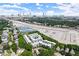Comprehensive aerial perspective showcasing the townhome community, nearby amenities, and the vibrant city skyline at 19 Moda Ln, Atlanta, GA 30316