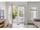 Bright living room with a balcony offering outdoor views at 19 Moda Ln, Atlanta, GA 30316