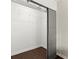 Spacious bedroom closet with a sliding door, wire rack shelving, and hardwood floors at 19 Moda Ln, Atlanta, GA 30316